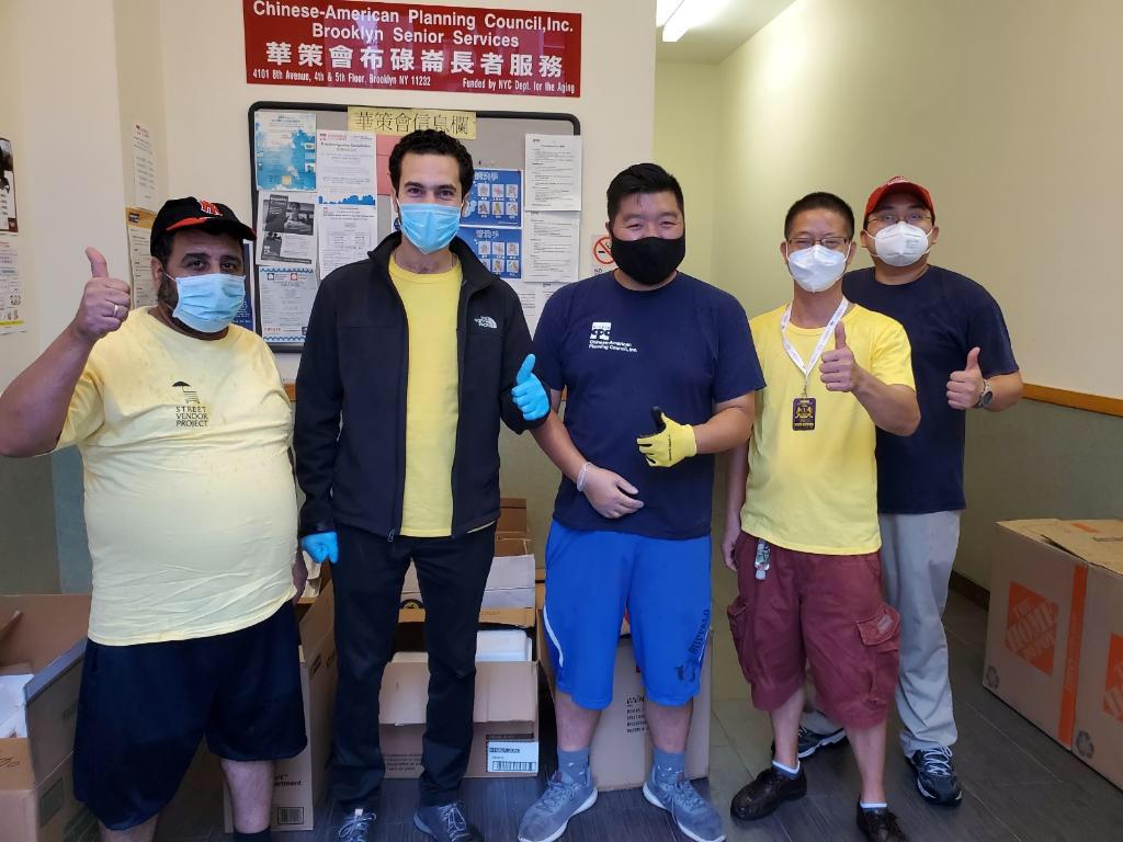 CPC staff and Street Vendor Project members stand together at CPC's Brooklyn Community Center in Sunset Park.