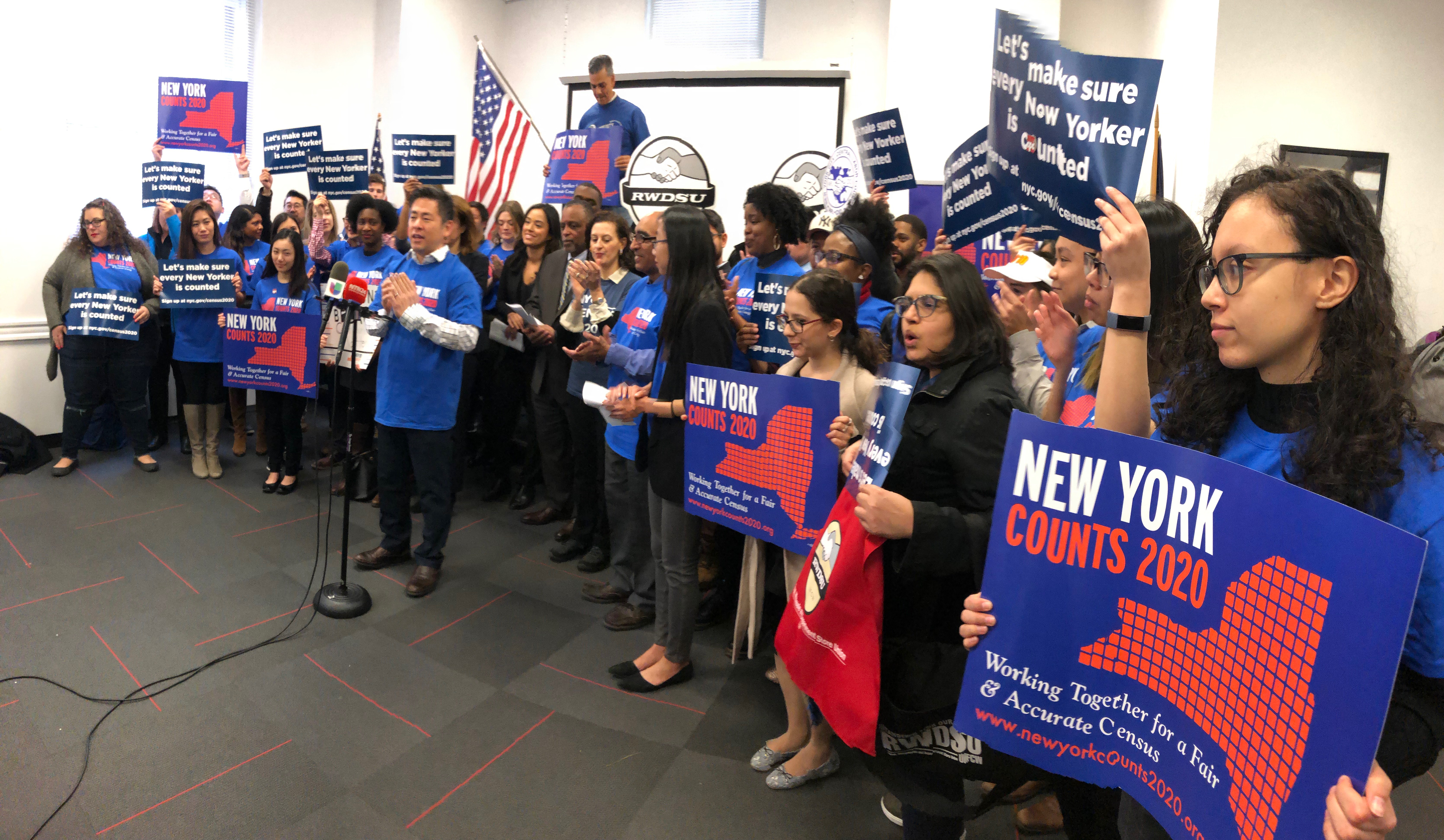 Group holding signs for 365 Countdown to 2020