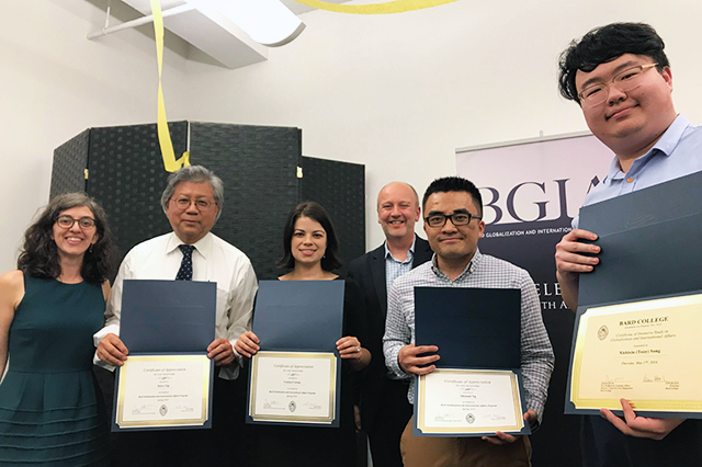 Tony Song, along with his supervisors and advisors at his graduation ceremony. 