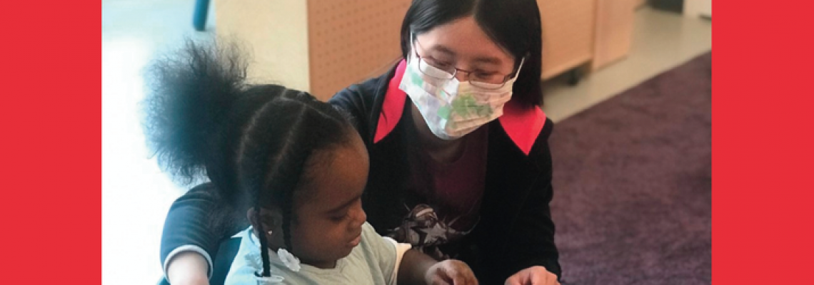 Image of woman and young girl teaching and learning