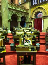 CPC participant sits in Assemblywoman Niou's Assembly Chamber chair