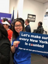 Emmy Holding Sign to Get the Count Out