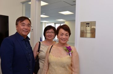 Tai Wang and friends in front of the Glow Foundation Classroom