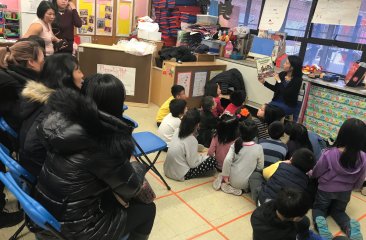 Teacher reading to students